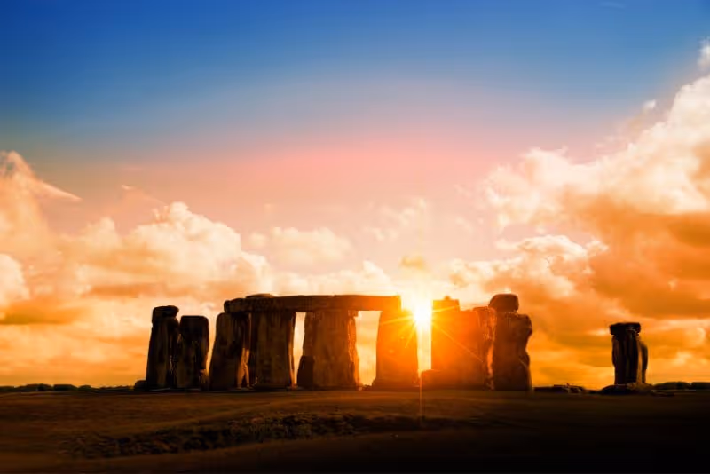 The massive sarsen stones of Stonehenge at sunrise